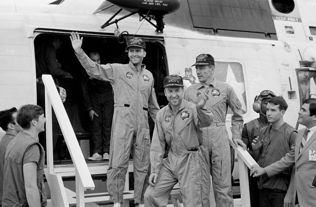 Apollo 13,  James A. Lovell,  John L. "Jack" Swigert and Fred W. Haise, arriving at the USS Iwo Jema after landing in the South Pacific Ocean